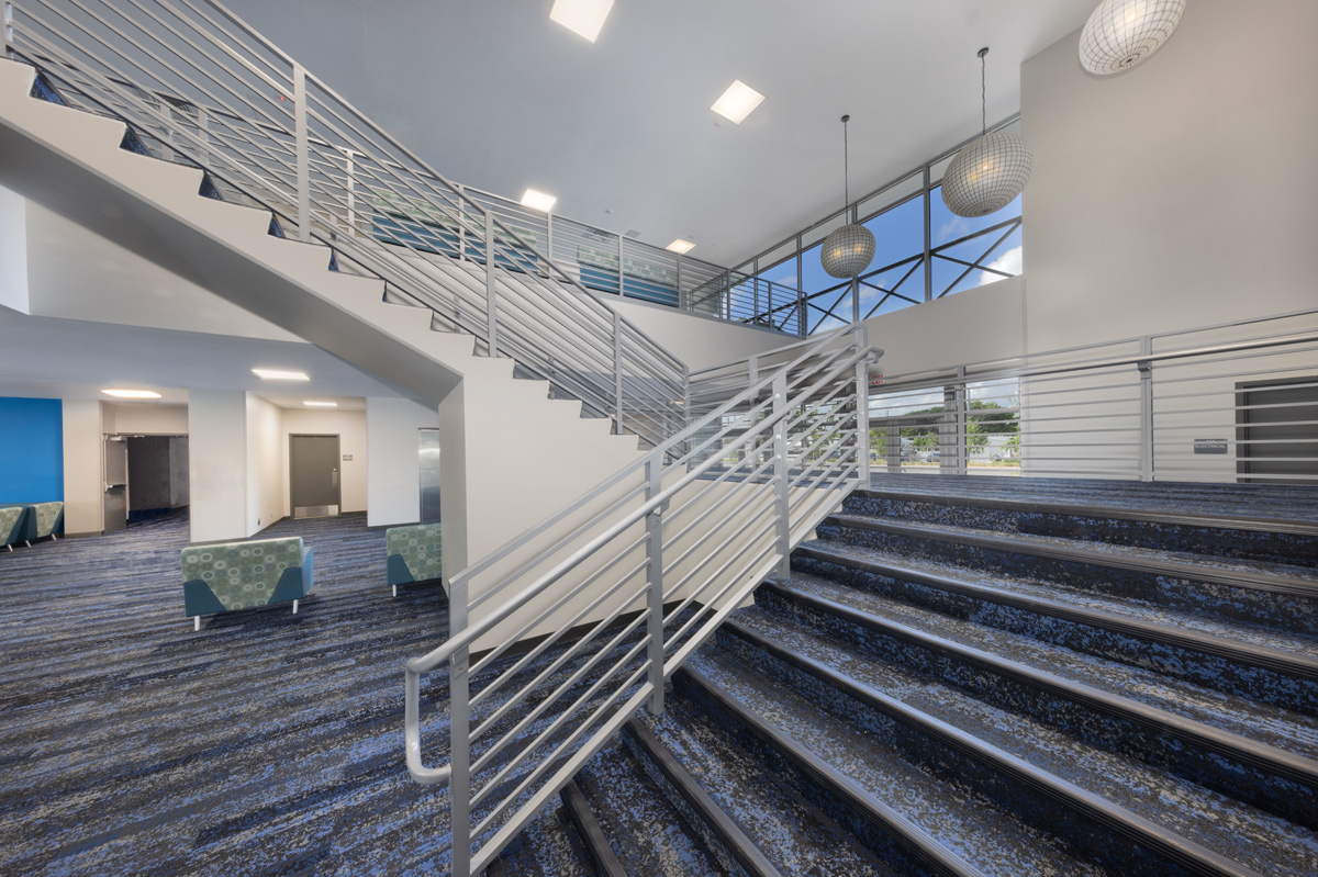 Interior design lobby staircase view of the College of the Florida Keys in Key Largo, FL.